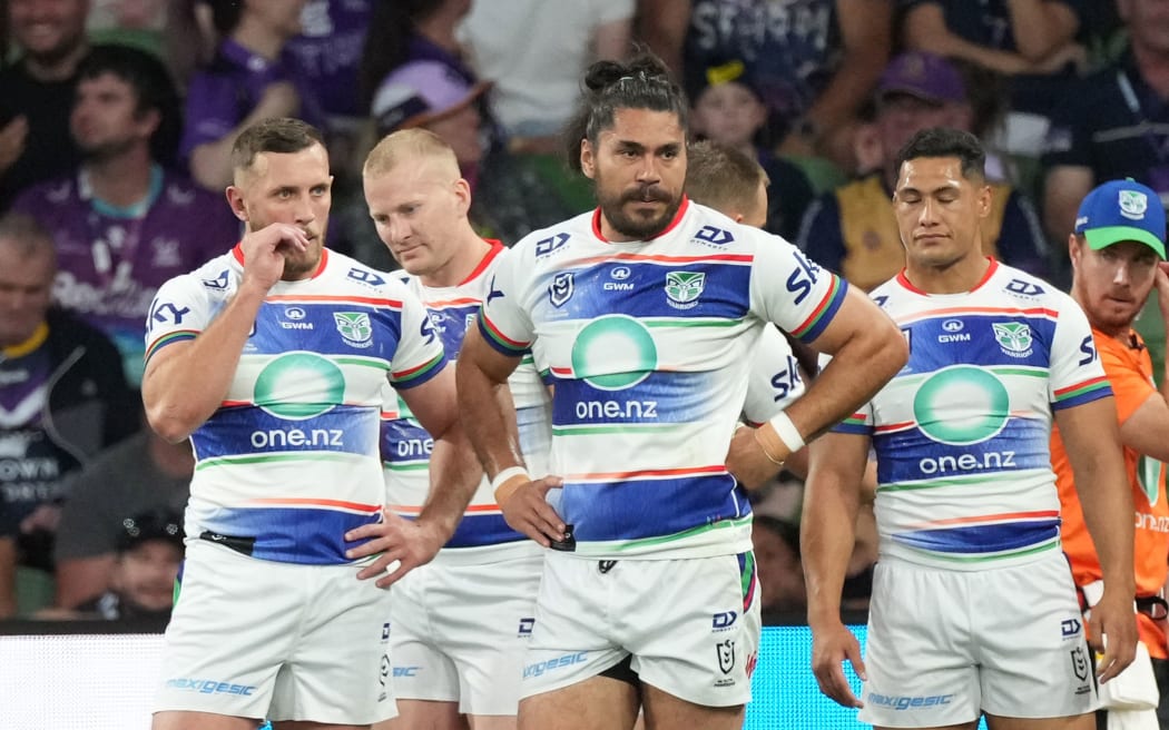 Tohu Harris and his teammates stand behind their goal line after conceding a try during the Melbourne Storm v New Zealand Warriors match during the Telstra NRL Premiership at AAMI Park, Melbourne.
