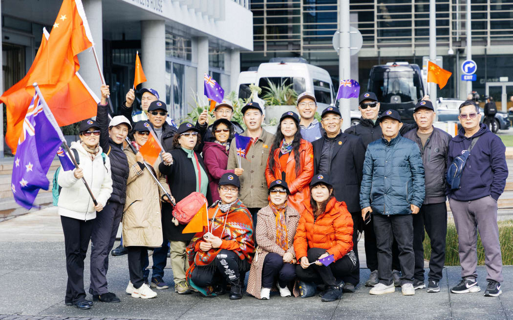 Supporters of Chinese premier Li Qiang waiting outside Fonterra, 15th June, Auckland.