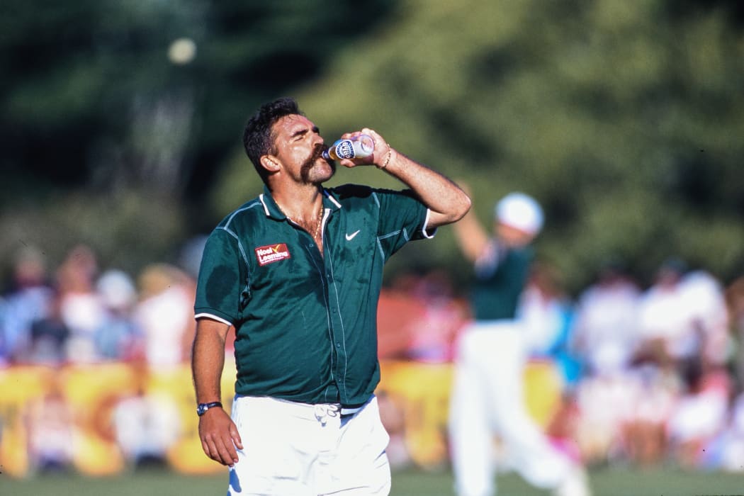 Australian cricketer Merv Hughes has a drink at the first Cricket Max game at Cornwall Park, Auckland, New Zealand 5th February 1996.