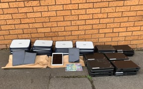 A burglary investigation led police to a discovery of around $40,000 worth of electronic devices allegedly stolen from schools across Auckland.