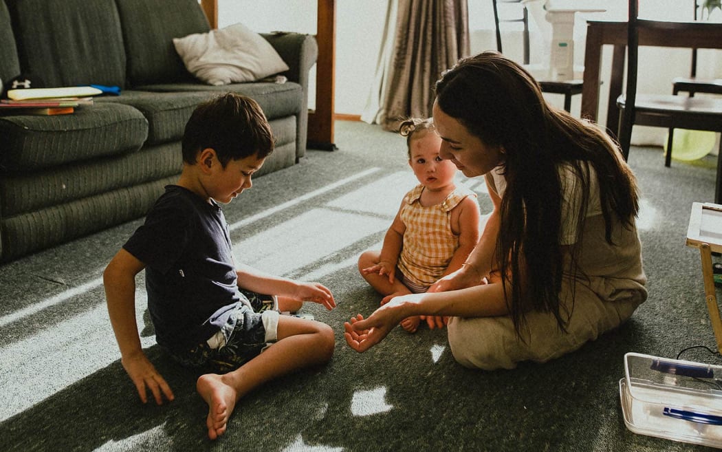 Renee White with her two children.