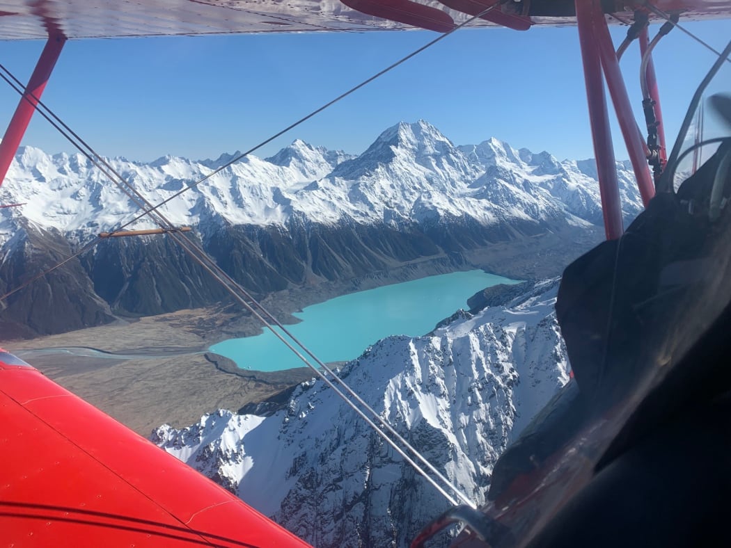 Aviation Adventures owner Chris Rudge says he was over Aoraki / Mt Cook at the exact same time as the first flight 100 years ago to the day.