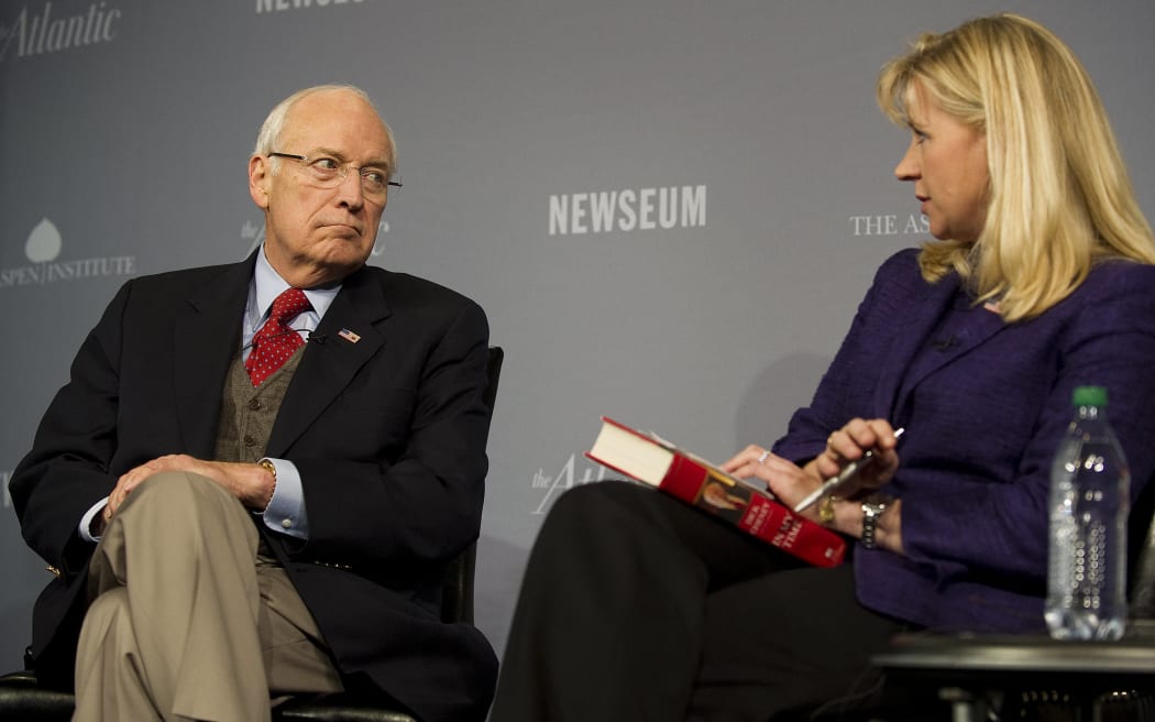 Former Vice President Dick Cheney is interviewed by his daughter Liz (R) during the 2011 Washington Ideas Forum at the Newseum in Washington, DC, October 6, 2011.     AFP PHOTO/Jim WATSON (Photo by JIM WATSON / AFP)