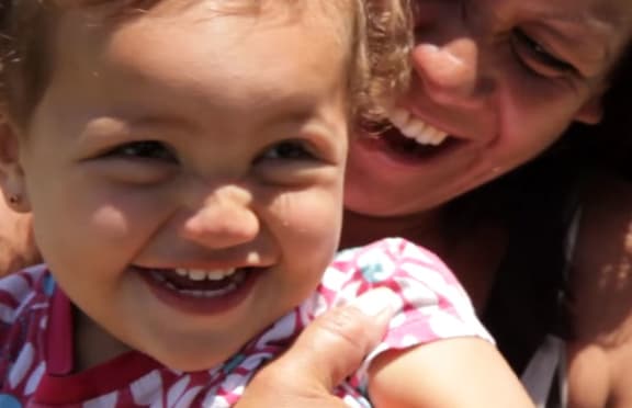 He Korowai Trust client Rachel Hutton with her daughter
