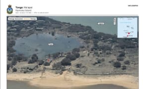 Nomuka Island in Ha'apai, Tonga, as seen from an NZDF P-3 Orion reconnaisance flight after the eruption of Hunga Tonga-Hunga Ha'apai. The image caption says extensive damage was  observed through the village with most coastal buildings destroyed.