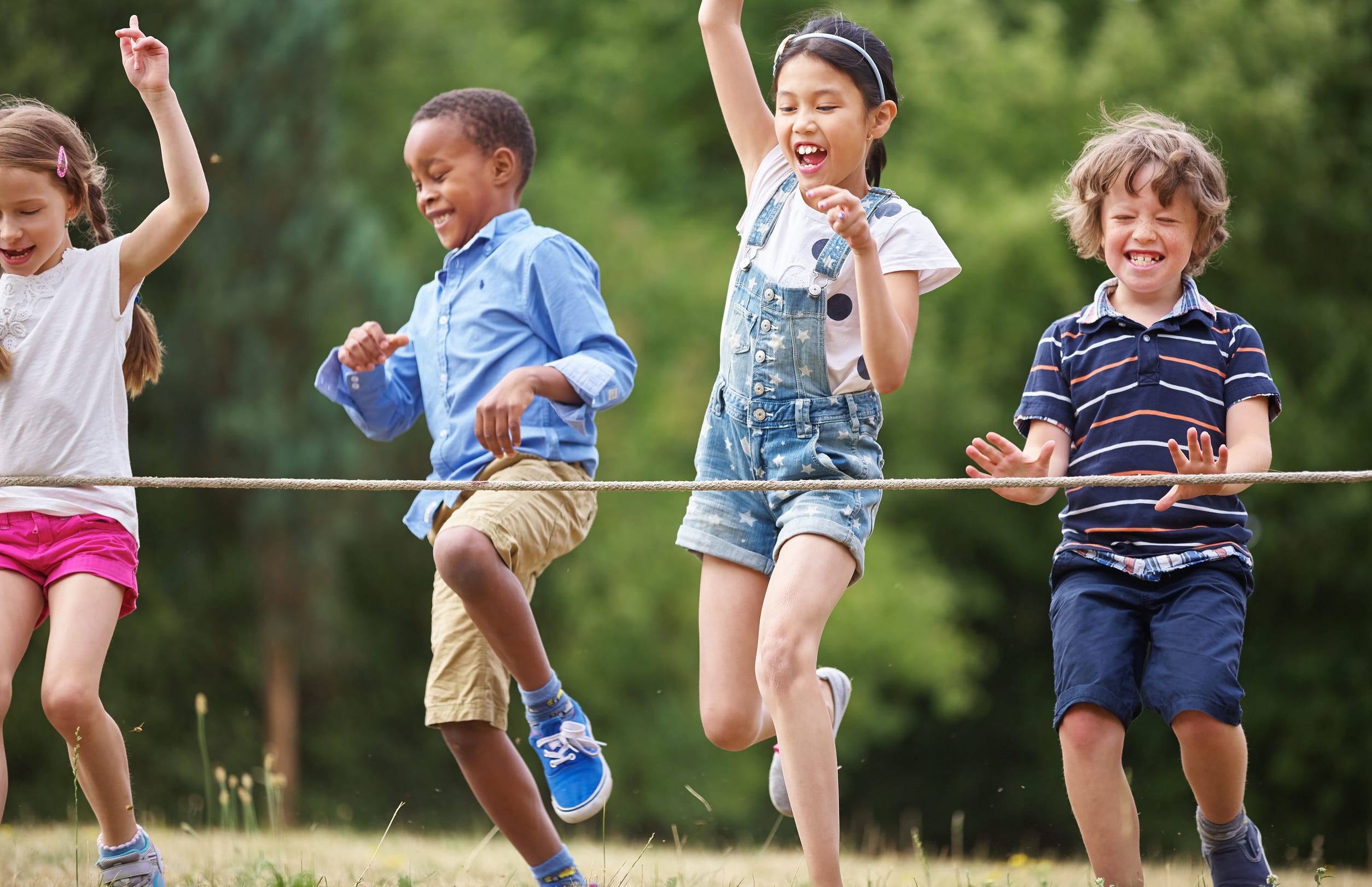 48658696 - A photo of children arriving to the finish line at race at a birthday party