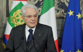 Italian President Sergio Mattarella talks with journalists at the end of the second day of consultations with political parties at Quirinal palace in Rome on April 13, 2018.