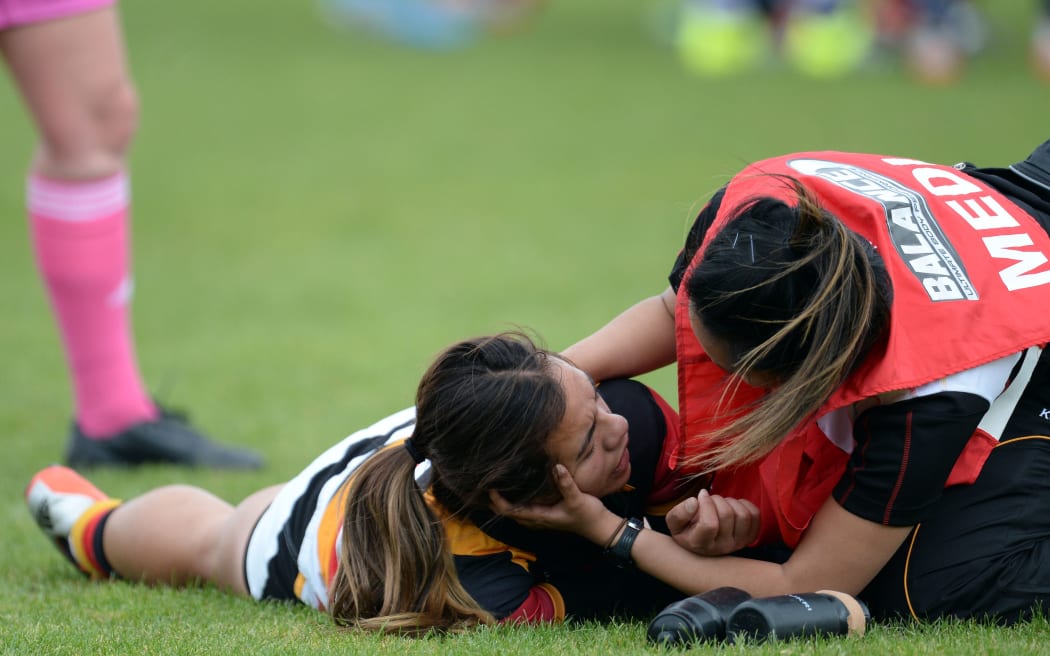 Waikato's Stacey Waaka is checked for concussion during the Women's Rugby NPC semifinal in October 2015.