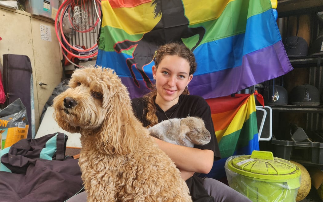 Dog and newborn lamb with Radha