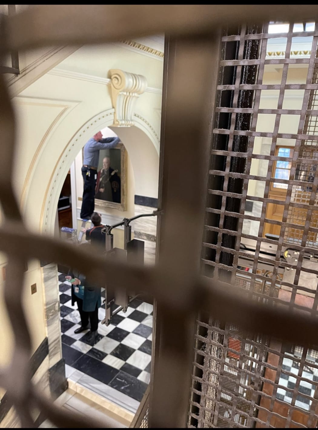 Work underway to relocate the painting of Winston Churchill at Parliament.