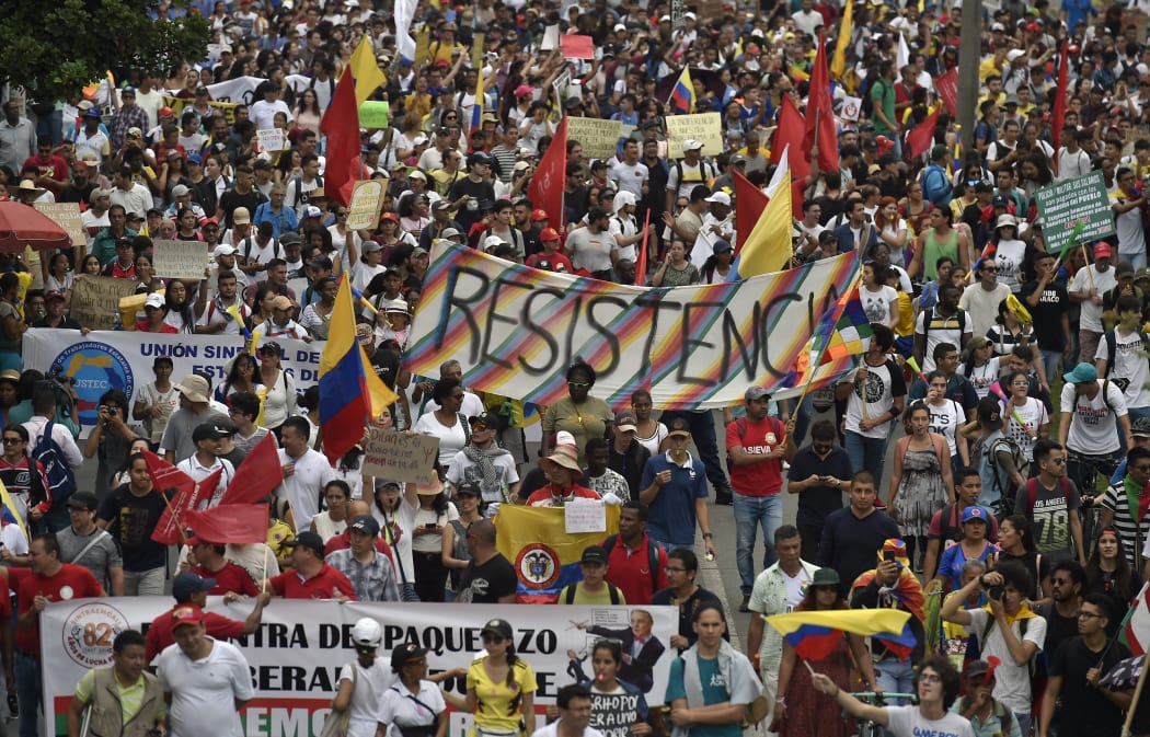 People take part in a march against the government of Colombian President Ivan Duque during a national strike, in Cali on November 27, 2019.