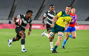 Jerry Tuwai scored two tries as Fiji advanced to the semi finals at the Tokyo Olympics.