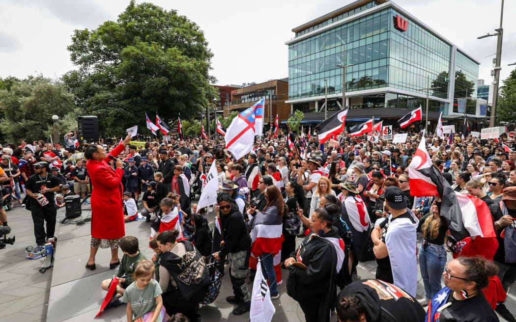 Supporters of the hīkoi rally at the Bridge of Remembrance in Christchurch on 13 November 2024.