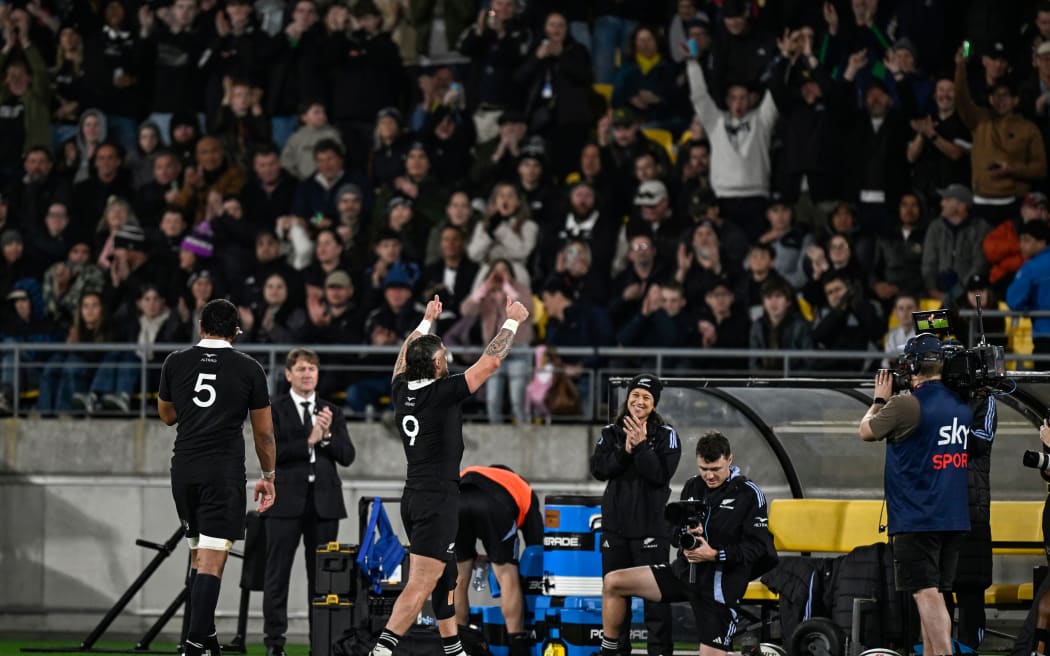TJ Perenara of New Zealand leaves the field and acknowledges the fans and supporters.