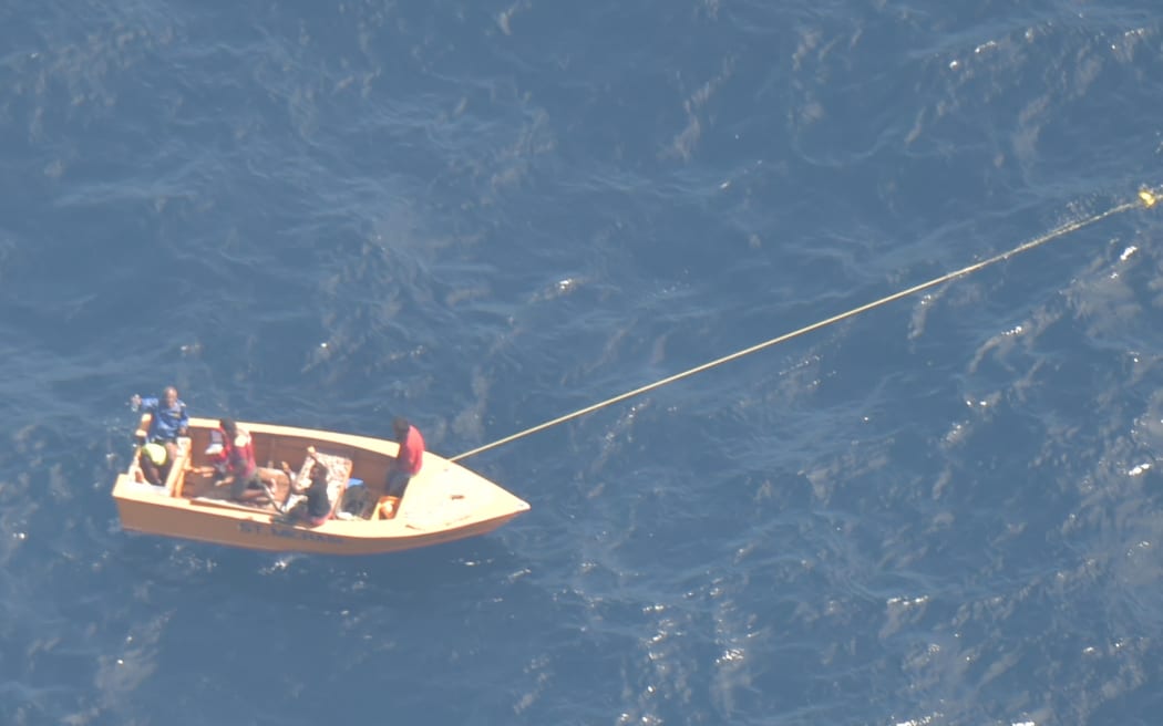 Survivors on a boat from Kiribati were dropped a survival pack with an activated locator beacon which pinpointed their location for rescuers.