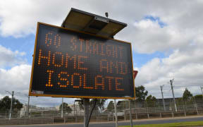 \A warning sign is seen as part of Covid-19 precautions as Australia's Victoria state reimposes lockdown.