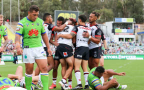Warriors celebrating Tohu Harris try against Raiders