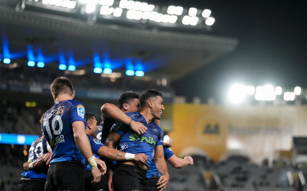 The Blues celebrate with Rieko Ioane during the Blues v Waratahs, Super Rugby Pacific match, Eden Park, Auckland.