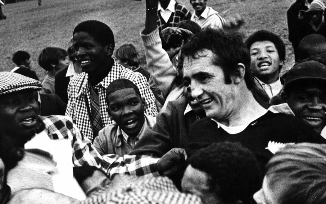 Andy Leslie mobbed by supporters after an All Blacks game in South Africa in 1976.
