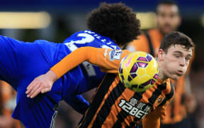 Chelsea v Hull City - Willian of Chelsea in action with Andrew Robertson of Hull City.