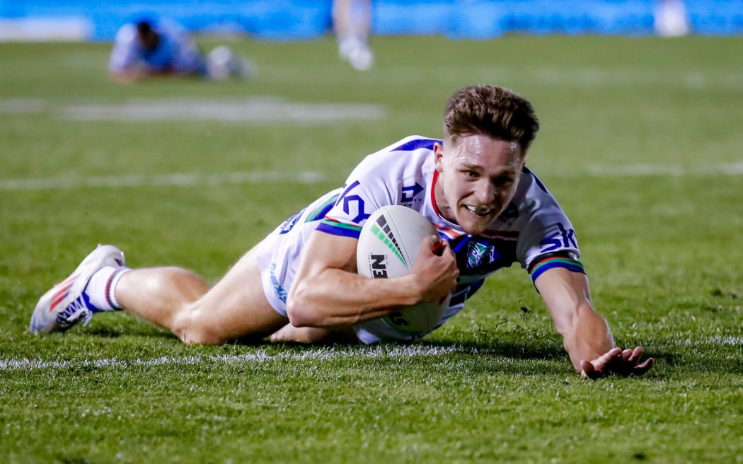 Luke Metcalf dives in to score.
