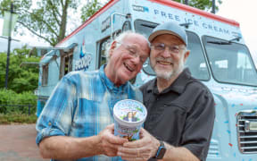 PHILADELPHIA, PENNSYLVANIA - SEPTEMBER 16: (L-R) Ben Cohen and Jerry Greenfield, co-founders of Ben & Jerry’s, partnered with MoveOn to hand out free ice cream at Franklin Square in Philadelphia during their Scoop The Vote tour to get-out-the-vote for Vice President Kamala Harris and Democrats down the ballot on September 16, 2024 in Philadelphia, Pennsylvania.   Lisa Lake/Getty Images for MoveOn/AFP (Photo by Lisa Lake / GETTY IMAGES NORTH AMERICA / Getty Images via AFP)