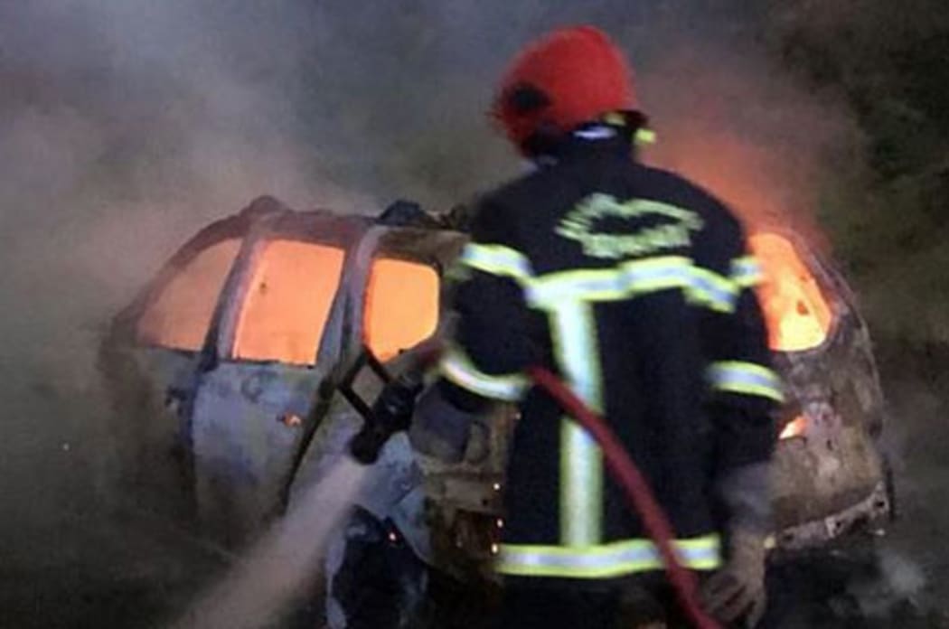 The New Caledonia Fire Service vehicle on fire.