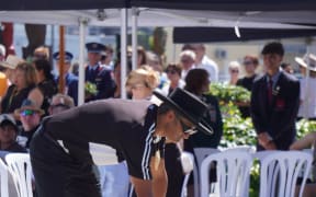 Ngāti Kahungunu iwi chair Bayden Barber lays a wreath on behalf of the iwi whānau.  Civic Square in Hastings, 14 February 2024.