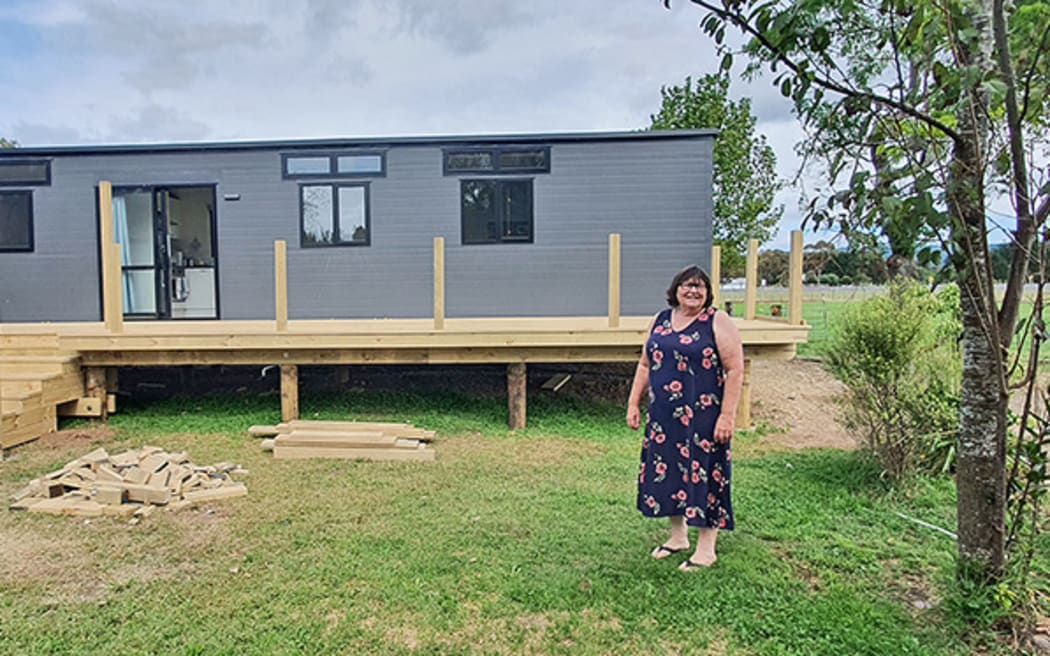 Jane Kay simply wanted to place her transportable tiny home in her daughter’s backyard, but has had to jump through hoops to make it compliant with Whakatāne District Council rules.