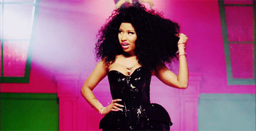 an animated gif of Nicki Minaj flicking her hair