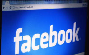 A file photo of the Facebook logo on a desktop computer