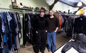 Evan Fraser (right) is the manager of Recycle Boutique. His sister Katelyn, dressed head to toe in black.