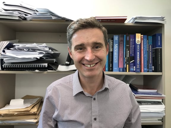 Clinical microbiologist & immunologist James Ussher in his office in the University of Otago.