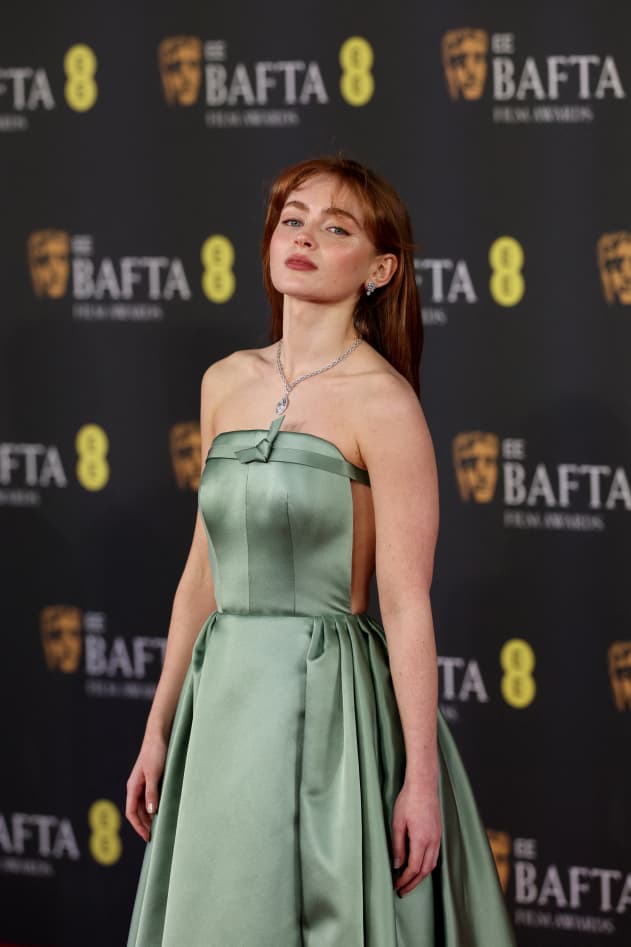 US actress Sadie Sink poses on the red carpet upon arrival at the BAFTA British Academy Film Awards at the Royal Festival Hall, Southbank Centre, in London, on February 22, 2026. (Photo by Adrian Dennis / AFP)