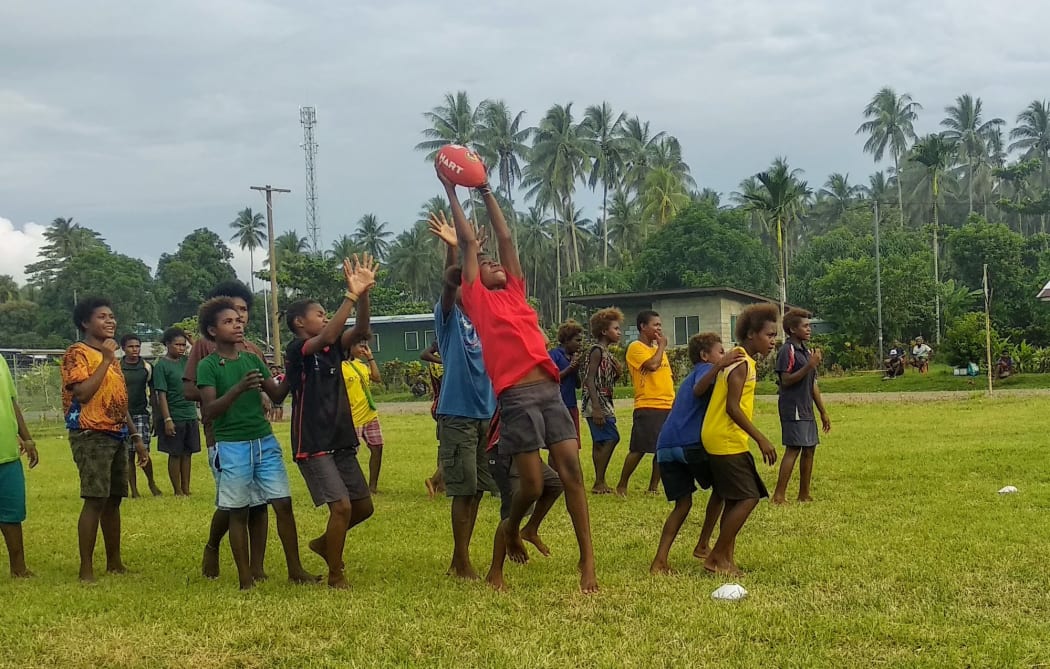 Scott Reid founded AFLPNG in 2001 and helped to grow the sport over more than two decades.