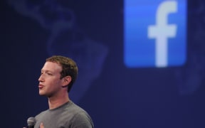 Facebook CEO Mark Zuckerberg introduces a new messenger platform at the F8 summit in San Francisco, California, on March 25, 2015.