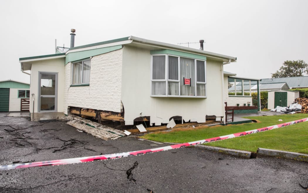 A red stickered house in Kaikōura