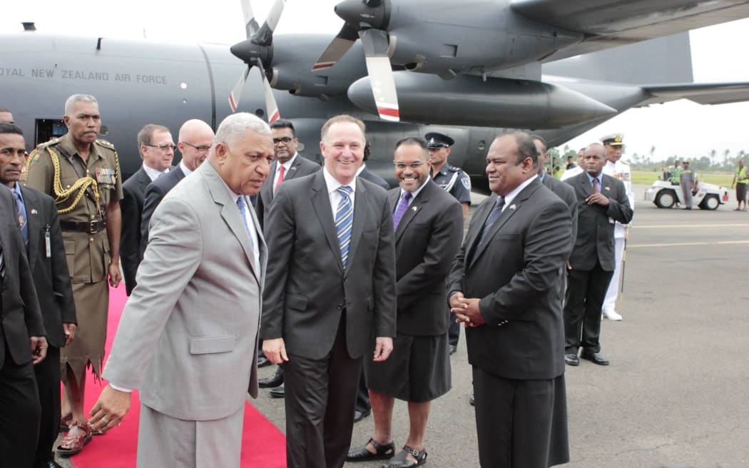 New Zealand's prime minister John Key and Fiji's prime minister Frank Bainimarama on Mr Key's arrival in Suva on Thursday.