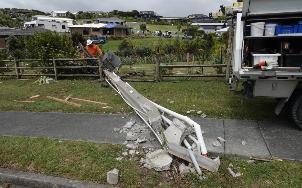 A broken power pole in Mangawhai, after a storm ripped through the town, 26 January 2025.