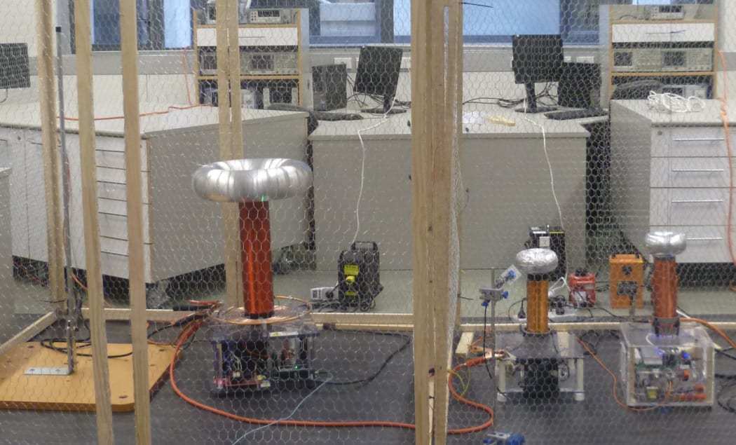 The Chime Red performance uses three Tesla coils, which produce high voltage electrical arcs. To minimise the leakage of these and ensure audience safety the coils are contained in a Faraday cage.