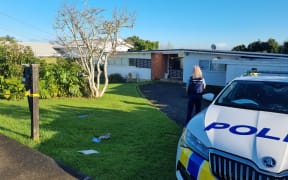 Police at a house on Bleakhouse Road, Mellons Bay, where shots were fired on Wednesday 25 May.