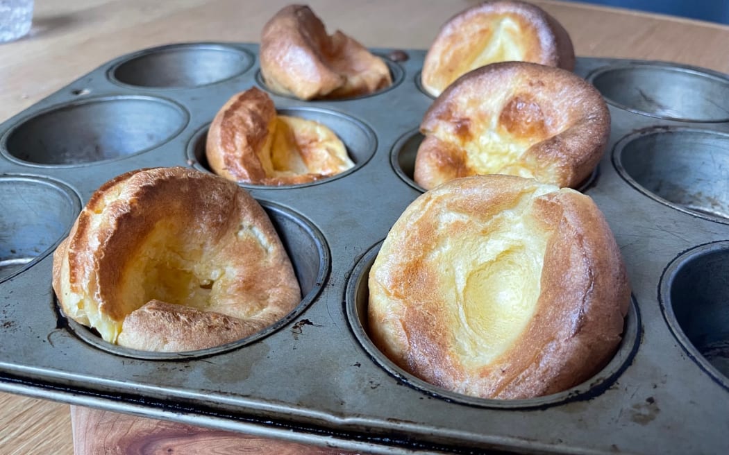 Dutch baby pancakes cooked in a muffin tin