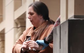 Convicted murderer Erin Patterson is escorted out of the Supreme Court of Victoria following the day's proceedings in a pre-sentencing hearing in Melbourne on 25 August, 2025.
