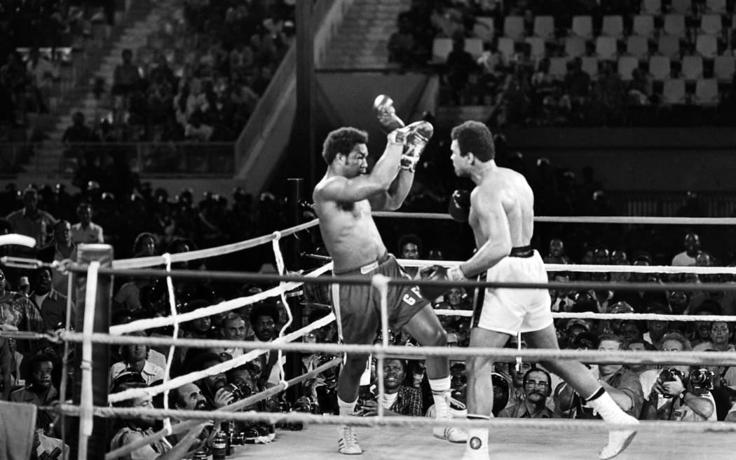 Muhammad Ali and George Foreman meet in the Rumble in the Jungle in Zaire in 1974.