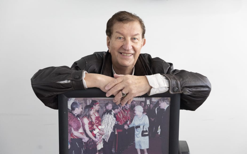 Trevor Maxwell with his photo of meeting the Queen in 2012.