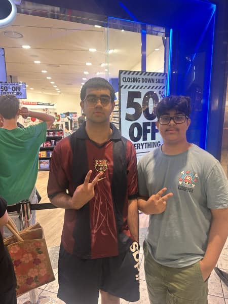 Brothers Kartik and Shivansh Sehgal at EB Games in St Lukes, Auckland.