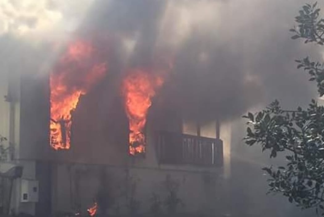 The fire engulfed the house on Archboyd Avenue in Mangere.