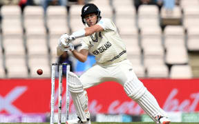 New Zealand's Tim Southee plays a shot on the fifth day of the ICC World Test Championship Final between New Zealand and India at the Ageas Bowl in Southampton, southwest England on June 22, 2021.