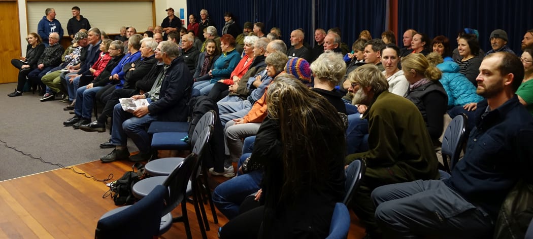 About 70 residents packed out the island's community hall.
