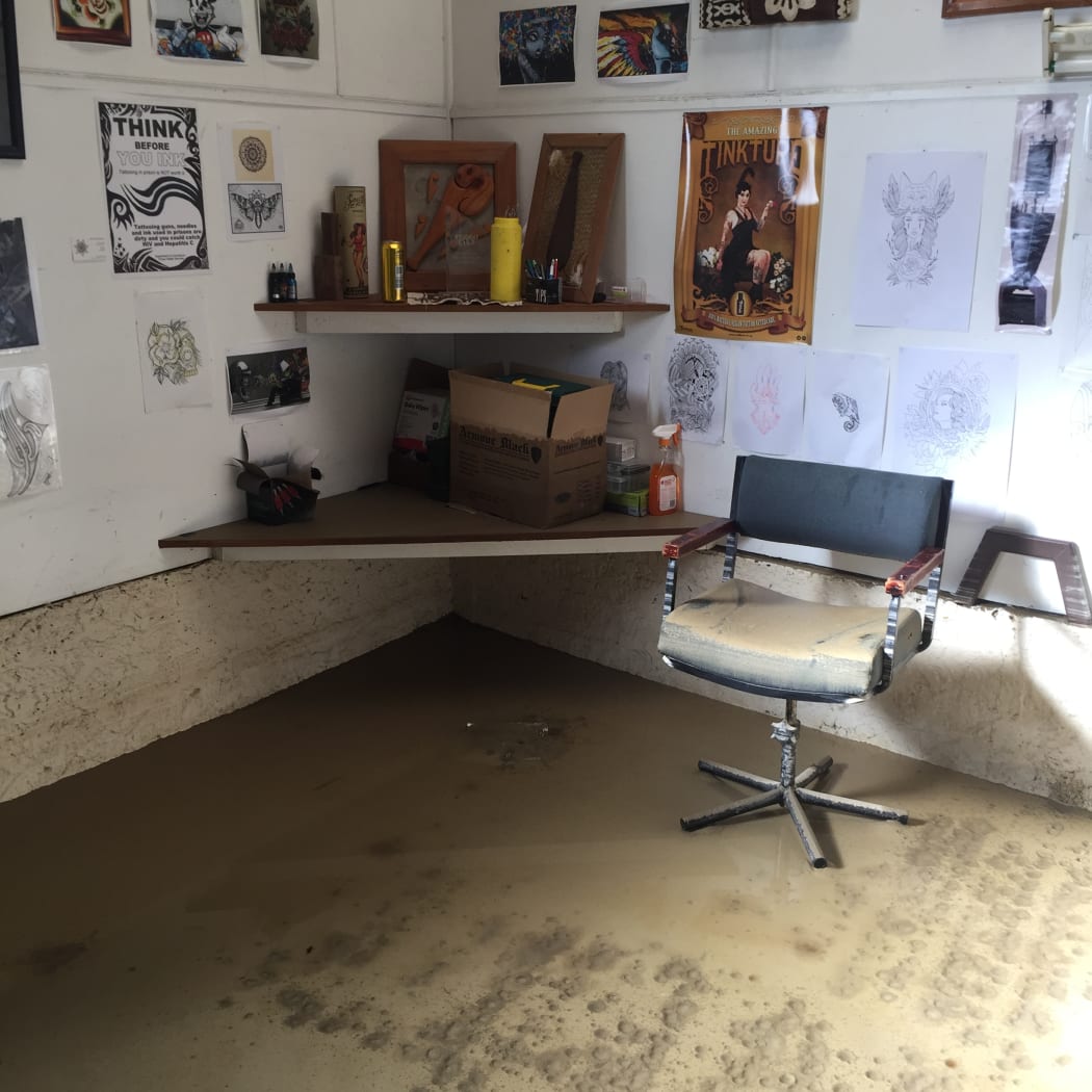 Thick mud has covered the studio's floor.